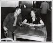 Photograph: [A United States Army private and a woman in Austin's U.S.O. Club]