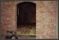 Primary view of [Arched Doorway in Brick Wall]