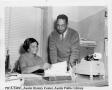 Primary view of [Catherine Lamkin and Howard Norris in Office]
