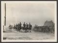 Photograph: [Cavalry Soldiers on Horseback and Marching]