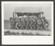 Photograph: [Soldiers Moving Barrack]