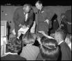 Primary view of [Barry Goldwater Signs Autographs for Crowd]