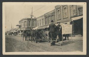 Primary view of object titled '[Postcard of Horses on a Street]'.