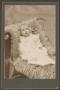 Photograph: [Photograph of a Small Baby Lying on Fur]