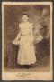 Photograph: [Photograph of a Young Girl in a Light Color Dress]