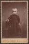 Primary view of [Photograph of an Unknown Child in Dark Clothing]