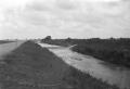 Photograph: [Flooded Channel Interstate 35 Frontage Road]
