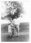 Photograph: [Family by a Tree]