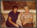 Photograph: [Gayle Snell and Woman on Couch]