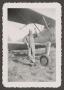 Photograph: [Herman F. Fuchs with Biplane]