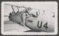 Photograph: [Herman Fuchs and WASP Student with Biplane]