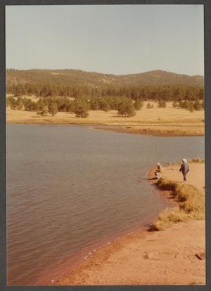 Primary view of object titled '[Man with Woman Fishing in Mountain Lake]'.