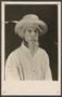 Photograph: [Photo of a Man Wearing a Fake Beard and Hat]