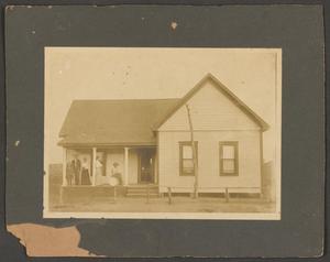 Primary view of object titled '[House with People on the Porch]'.