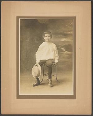 Primary view of object titled '[Photograph of a Boy With a Hat]'.