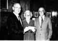 Primary view of John Tucker, left, accepts a donation on behalf of Friends of Lee College from Mr. & Mrs. John A. Atchison for the hearing-impaired program at Lee.