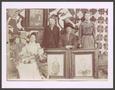 Primary view of [Asberry Family Posing with Portraits]