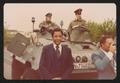 Thumbnail image of item number 1 in: '[Lee Brown and Darryl Gates in Front of a Tank]'.