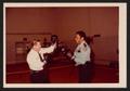 Primary view of [Photograph of Lee Brown and a Houston Fire Department Administrator Boxing]