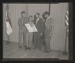 Photograph: [Boy Scout Holding Award]