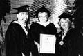 Photograph: Jean Shepherd, center, displays her honorary degree from Lee College,…