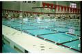 Photograph: [Swim meet in Natatorium including Texas A&M team]