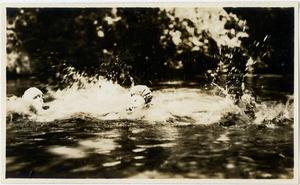 Primary view of object titled '[Three people swimming]'.