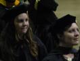 Photograph: [Two Students at Masters Commencement Ceremony]