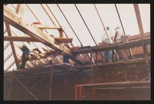 Primary view of object titled '[View of Workers Constructing Outer Edge of Roof from Interior #2]'.