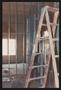 Photograph: [Ladder in Front of Metal Studs]