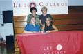 Primary view of [Abby Davis signing volleyball scholarship agreement]
