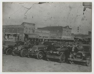 Primary view of object titled '[Copy of a 1920s Photograph of Fire Trucks Parked in the Square, Marshall, Texas]'.