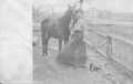 Postcard: [Evelyn Baker Moers (Mrs. C.A. Moers) with her horse.]