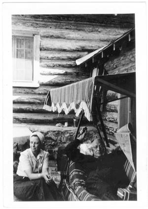 Primary view of object titled '[Col. Hugh B. Moore relaxing at the cabin in New Mexico]'.