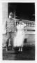 Photograph: [Col. Hugh B. Moore in uniform and Helen Moore in front of their home]