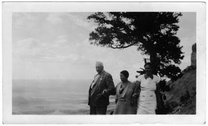 Primary view of object titled '[Col. Hugh B. and Helen Moore and Mrs. Crawford taking a walk]'.