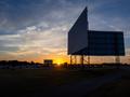 Photograph: [Drive-in Movie Theater Screens at Sunset]