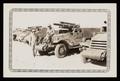 Photograph: [Soldiers Posing with Armored Vehicles]