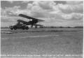 Photograph: M.G.M. Filming "West Point in the Air" with a Biplane Landing