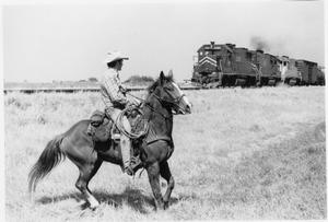 Primary view of object titled 'Texas Sesquicentennial Wagon Train on the Way from Bishop to Kingsville'.