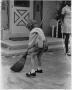 Photograph: Child Sweeping at Children's Center at TCJC