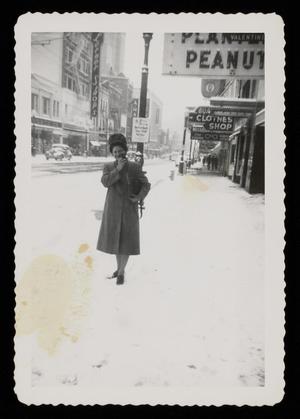 Primary view of object titled '[Sheila Emery Allen in downtown snow]'.