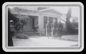 Primary view of object titled '[Cousin Maggie Hale, Aunt Annie Belle Emery Bright, Lucy Wright, and cat in front of house at 2256 5th Avenue in Fort Worth]'.