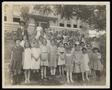 Photograph: [Large elementary school class outside]