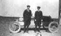 Photograph: [Men Posing in front of Hot Rod Model T]
