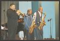 Thumbnail image of item number 1 in: '[Ira Bassett, Marchel Ivery, and David "Fathead" Newman Performing]'.