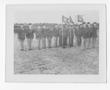 Photograph: [Servicemen Standing at Attention with Flags]