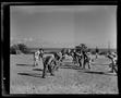 Thumbnail image of item number 1 in: '[Military Service Members Playing Football at Okinawa Officers Club and Recreation]'.
