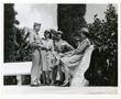 Photograph: [Members of the Women's Auxiliary Corps Laughing With Officers]