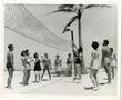 Photograph: [Women's Auxiliary Corps Members Playing Beach Vollyeball With Men]